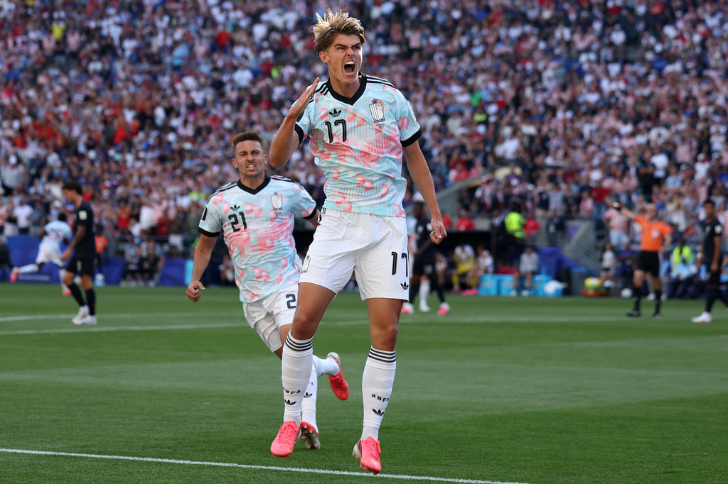 Belgium's Charles De Ketelaere (17) celebrates after scoring his side's opening goal during the World Cup round of 16 soccer match between the United States and Belgium in Seattle, Monday, July 6, 2026. (AP Photo/Maddy Grassy)