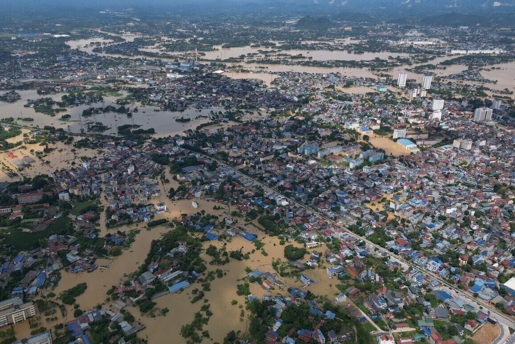 FILE- This aerial image shows flooding in the aftermath of typhoon Matmo in Thai Nguyen, Vietnam, Oct. 8, 2025. (Bui Cuong Quyet/VNA via AP, File)