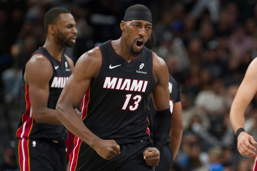 Miami Heat forward Bam Adebayo celebrates after a basket during the second half of an NBA basketball game against the San Antonio Spurs, Thursday, Oct. 30, 2025, in San Antonio. (AP Photo/Darren Abate) Miami Heat forward Bam Adebayo celebrates after a basket during the second half of an NBA basketball game against the San Antonio Spurs, Thursday, Oct. 30, 2025, in San Antonio. (AP Photo/Darren Abate)