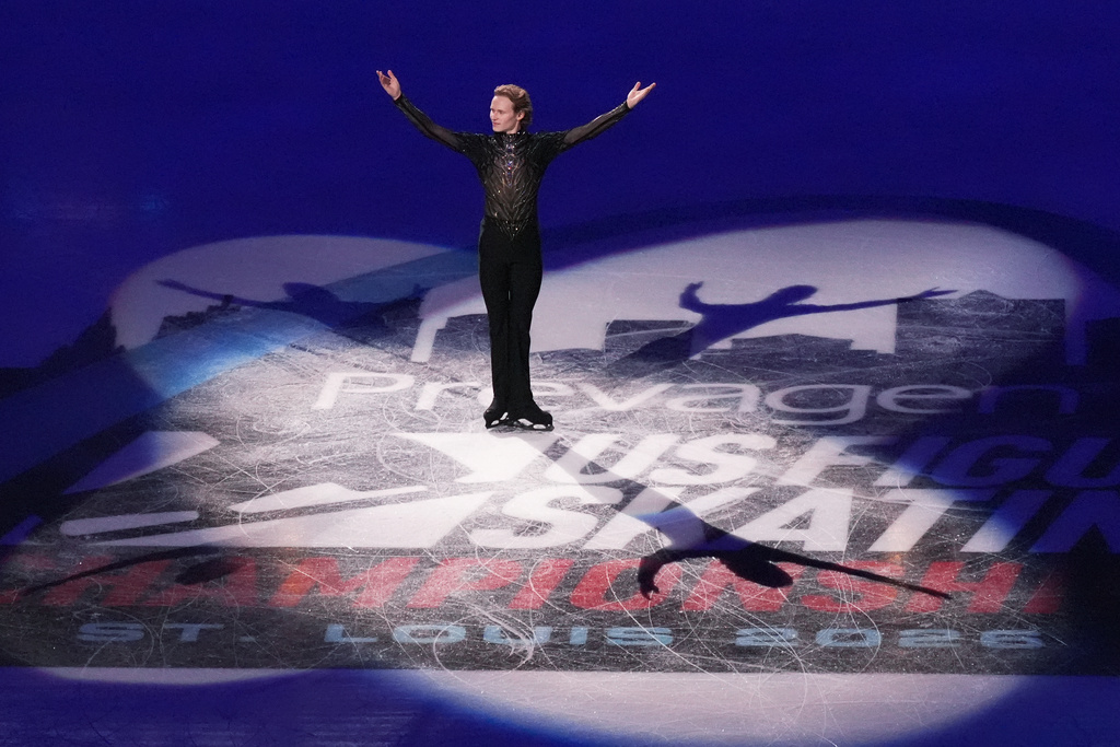 Gold medalist Ilia Malinin arrives for the medal ceremony after the men's free skate competition at the U.S. Figure Skating Championships, Saturday, Jan. 10, 2026, in St. Louis. (AP Photo/Jeff Roberson)
