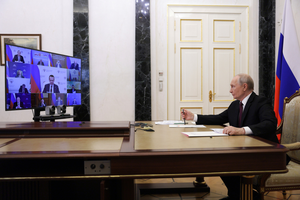 Russian President Vladimir Putin leads a cabinet meeting via videoconference at the Kremlin in Moscow, Tuesday, June 23, 2026. (Gavriil Grigorov/Sputnik, Kremlin Pool Photo via AP)