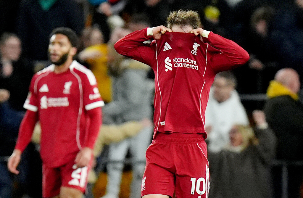 Liverpool's Alexis Mac Allister reacts after the team conceded a second goal against Wolverhampton Wanderers during an English Premier League match, Tuesday, March 3, 2026, in Wolverhampton, England. (Jacob King/PA via AP)