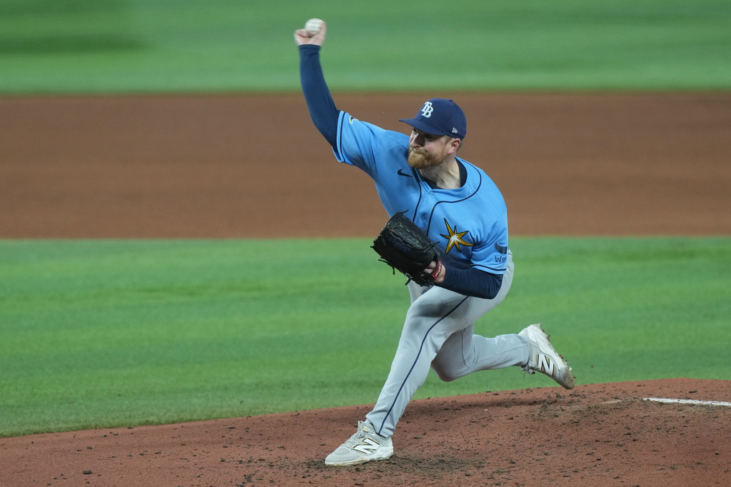 Tampa Bay Rays pitcher Drew Rasmussen aims a pitch during the fifth inning of a baseball game against the Miami Marlins Friday, June 5, 2026, in Miami. (AP Photo/Marta Lavandier)