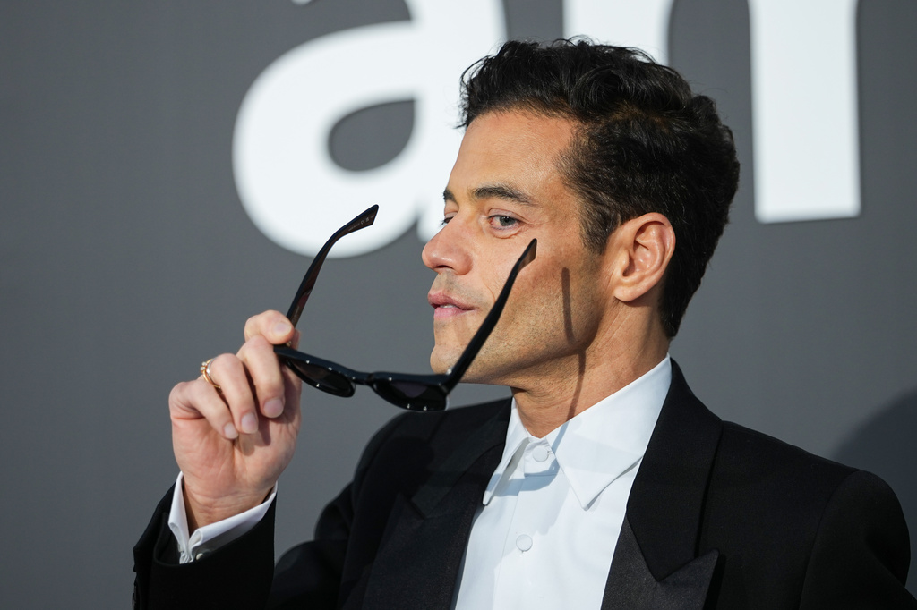 Rami Malek poses for photographers upon arrival at the amfAR Cinema Against AIDS benefit at the Hotel du Cap-Eden-Roc, during the 79th Cannes international film festival, Cap d'Antibes, southern France, Thursday, May 21, 2026. (Photo by Scott A Garfitt/Invision/AP)A