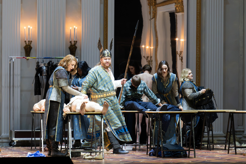 Bass-baritone Nicholas Brownlee portrays Wotan, second left, as he is surrounded by cast members portraying Wotan's Valkyrie daughters, in a production of Richard Wagner’s “Die Walkuere” at the Bavarian State Opera in Munich. (Monika Rittershaus/Bavarian State Opera via AP)