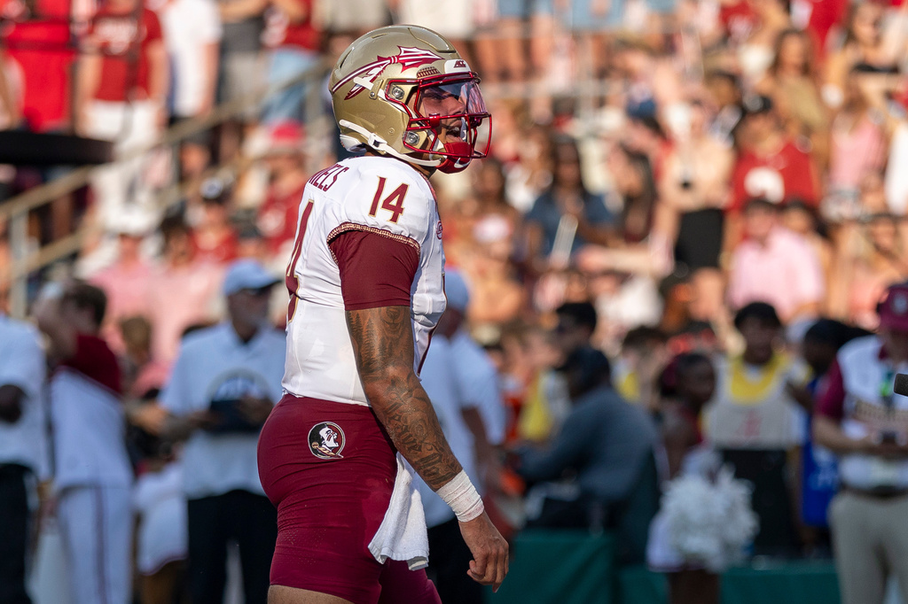 Florida State quarterback Ashton Daniels celebrates after his touchdown run against Alabama during the first half of an NCAA college football game Saturday, Sept. 19, 2026, in Tuscaloosa, Ala. (AP Photo/Vasha Hunt)