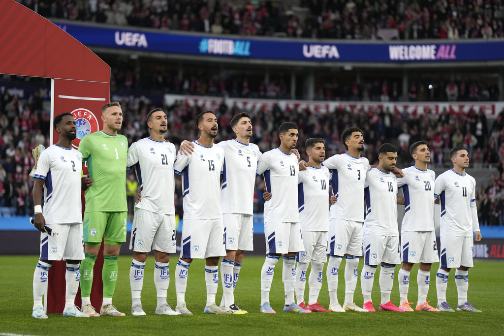 Israeli team sings the national anthem ahead of the World Cup qualifying soccer match between Norway and Israel, at the Ullevaal Stadion in Oslo, Saturday, Oct. 11, 2025. (Fredrik Varfjell/NTB Scanpix via AP)