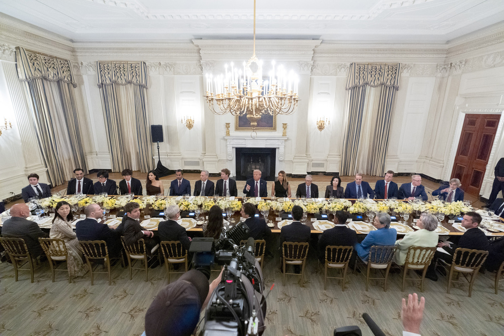 President Donald Trump points to a reporter to ask a question question during a dinner in the State Dining Room of the White House, Thursday, Sept. 4, 2025, in Washington. (AP Photo/Alex Brandon)