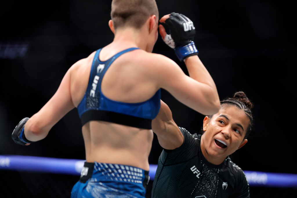 FILE - Natalia Silva, right, punches Rose Namajunas in a women's flyweight bout during the UFC 324 mixed martial arts event Saturday Jan. 24, 2026, in Las Vegas. (AP Photo/Steve Marcus, File)