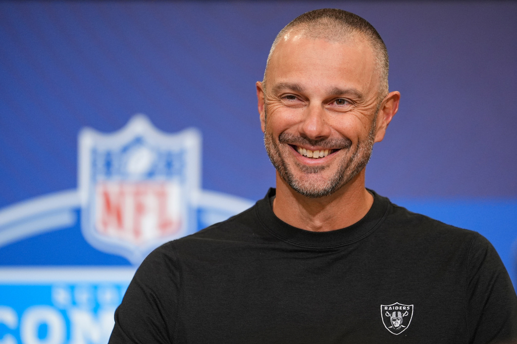 Las Vegas Raiders general manager John Spytek speaks during a press conference at the NFL football scouting combine in Indianapolis, Tuesday, Feb. 24, 2026. (AP Photo/Michael Conroy)