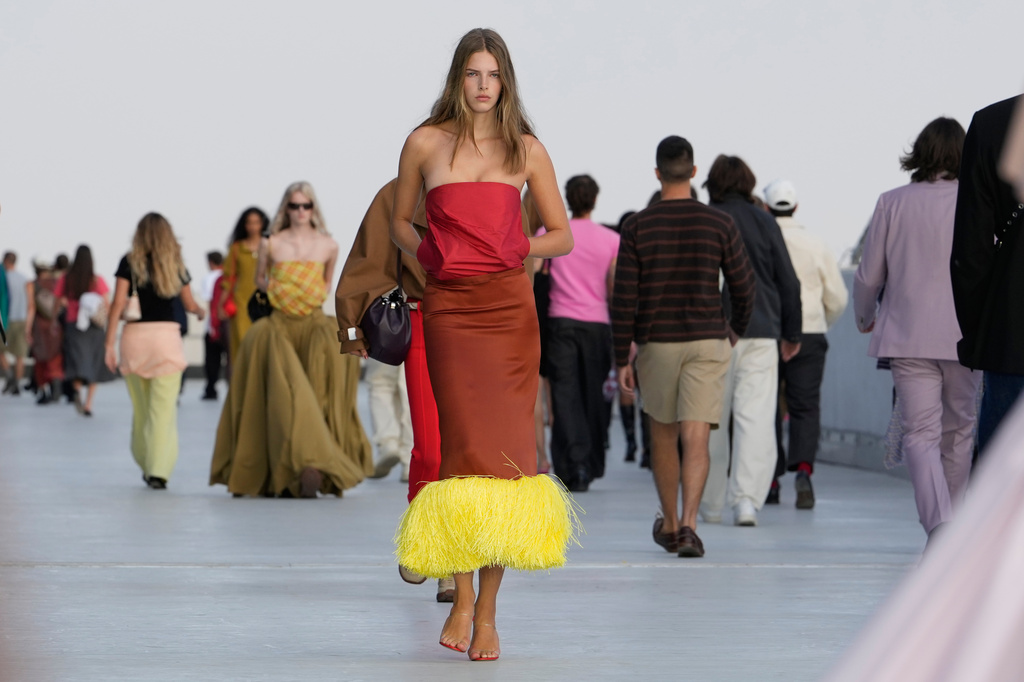 A model wears a creation part of the Moschino women's Spring-Summer 2027 collection, presented in Milan, Italy, Friday, Sept. 25, 2026. (AP Photo/Luca Bruno)