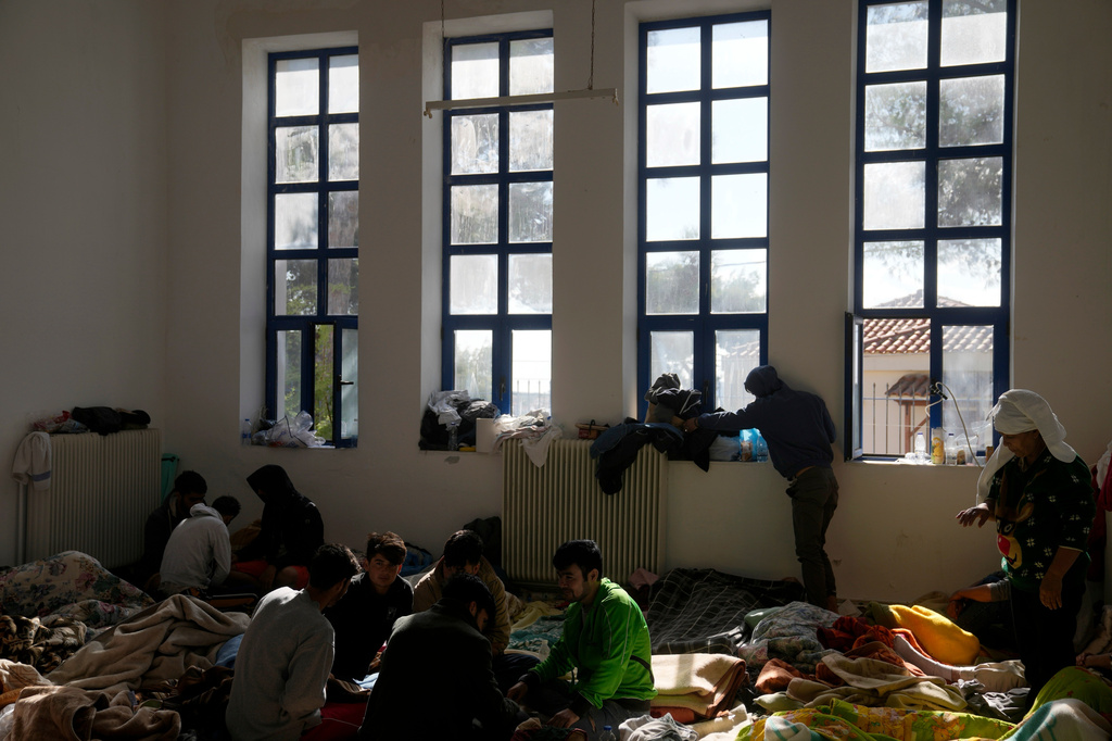 FILE - Migrants, most of them from Afghanistan, rest at an old school used as a temporary shelter on the island of Kythira, southern Greece, Oct. 7, 2022. (AP Photo/Thanassis Stavrakis, File)