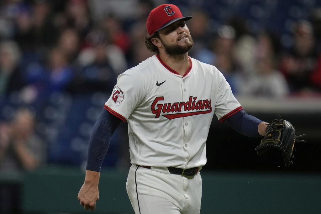Cleveland Guardians starting pitcher Slade Cecconi walks off the mound after the eighth inning of a baseball game against the Kansas City Royals in Cleveland, Monday, Sept. 8, 2025. (AP Photo/Sue Ogrocki)