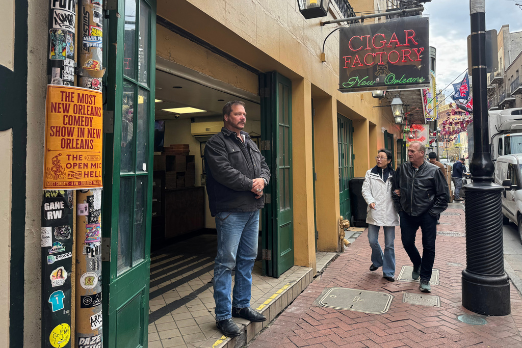 Buck Harley, a cigar shop manager, stands outside of his store Monday, Dec. 29, 2025, on Bourbon Street in New Orleans. (AP Photo/Jack Brook)