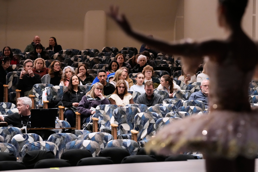 Audiences watch open stage for Senior Classical Competition Women Ages 16-17 during the Youth America Grand Prix (YAGP) Semi-Finals at Dominican University Performing Arts Center in River Forest, Ill., Saturday, Feb. 7, 2026. (AP Photo/Nam Y. Huh)