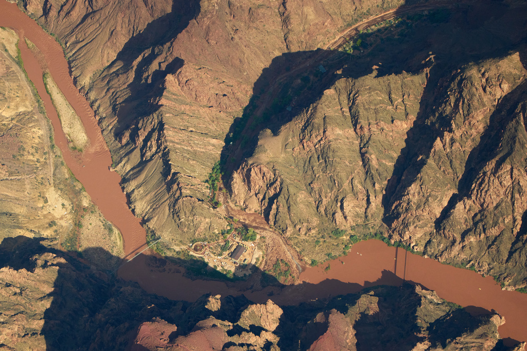 Bright Angel Canyon, the scene of flash floods, runs into the Colorado River in the Grand Canyon, Monday, Aug. 31, 2026, at Grand Canyon National Park, Ariz. (AP Photo/John Locher)