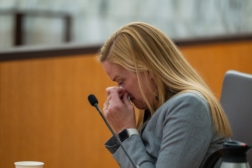 Camp director Mary Liz Eastland cries as she is questioned during a hearing on a lawsuit against Camp Mystic in the 459th State District Court in Austin, Texas, on Tuesday, April 14, 2026. (Mikayla Compton/Austin American-Statesman via AP) CORRECTION: changes last name Eastland, not Easton