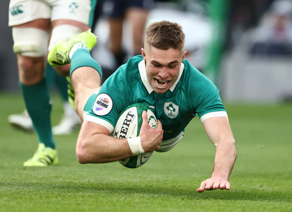 Ireland's Jack Crowley scores a try during the rugby union Nations Series match between Ireland and Japan in Dublin, Saturday, Nov. 8, 2025 . (AP Photo/Peter Morrison)