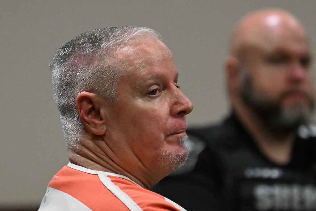 Colin Gray, father of the Apalachee High School shooter Colt Gray, sits with his attorneys during his sentencing hearing at Barrow County Superior Court on Thursday, July 30, 2026, in Winder, Ga. (Hyosub Shin/Atlanta Journal-Constitution via AP, Pool)