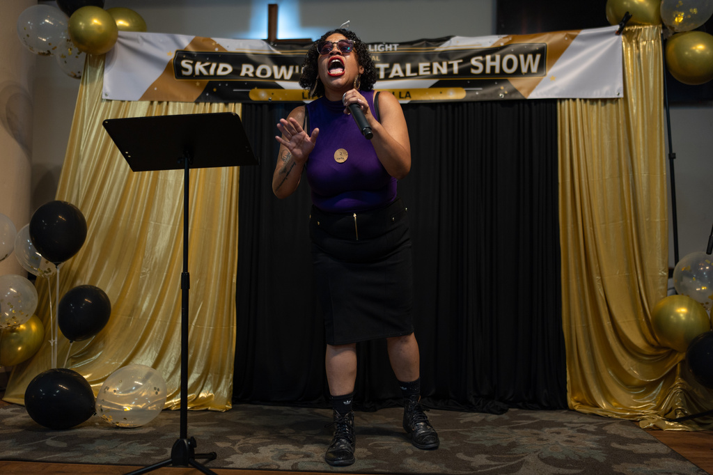 Cara Agrusa performs during Skid Row's inaugural talent show in downtown Los Angeles, Saturday, Sept. 19, 2026. (AP Photo/Jae C. Hong)