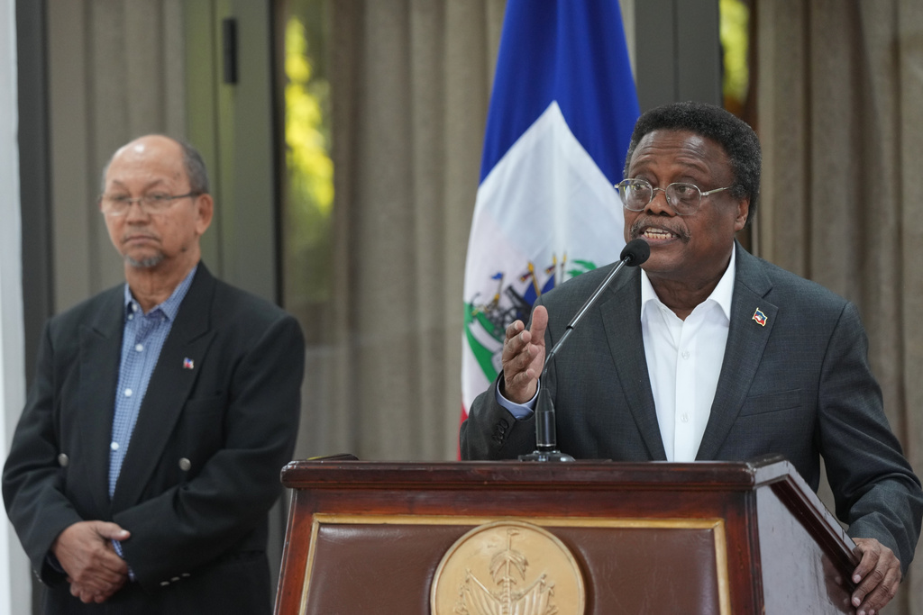 Fritz Alphonse Jean, a member of Haiti’s transitional presidential council, speaks during a press conference in Port-au-Prince, Haiti, Tuesday, Nov. 25, 2025. (AP Photo/Odelyn Joseph)