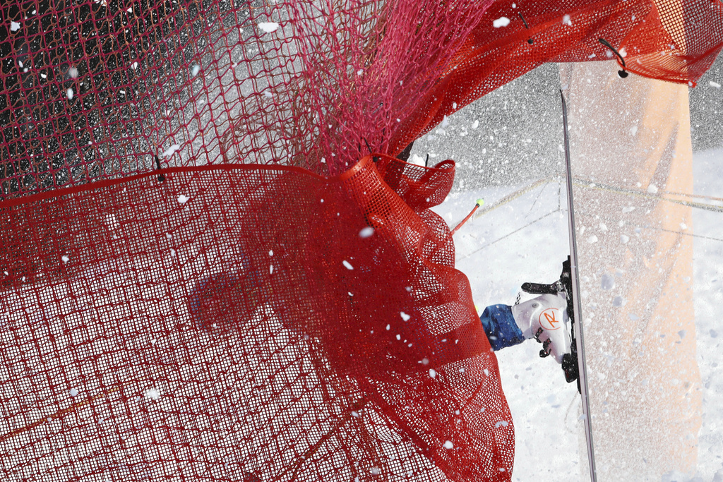 FILE - United States' Ryan Cochran Siegle crashes onto the safety net during an alpine ski, men's World Cup downhill in Kitzbühel, Austria, Friday, Jan. 22, 2021. (AP Photo/Marco Trovati, File)