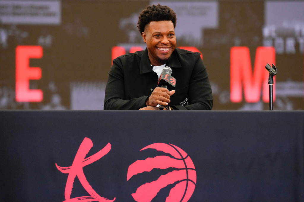 Kyle Lowry speaks at a press conference as he signs a one-day contract to retire as a Toronto Raptor, in Toronto, on Tuesday, July 7, 2026. (Chris Young/The Canadian Press via AP)