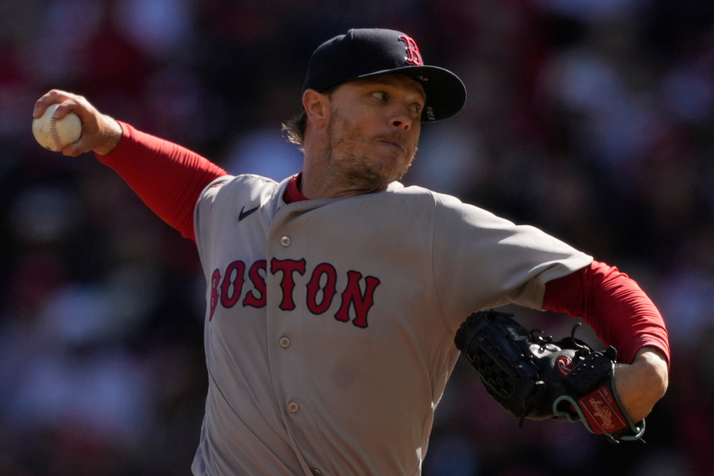 Boston Red Sox pitcher Sonny Gray throws during the first inning of a baseball game against the Cincinnati Reds and the Boston Red Sox in Cincinnati, Saturday, March 28, 2026. (AP Photo/Carolyn Kaster)