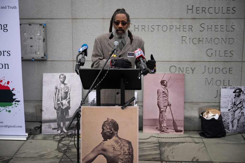 Attorney and founder of Avenging the Ancestors Coalition Michael Coard speaks during a rally celebrating the reinstallation of a slavery exhibit at the President's House Site in Philadelphia on Thursday, Feb. 19, 2026, in Philadelphia. (AP Photo/Joe Lamberti)