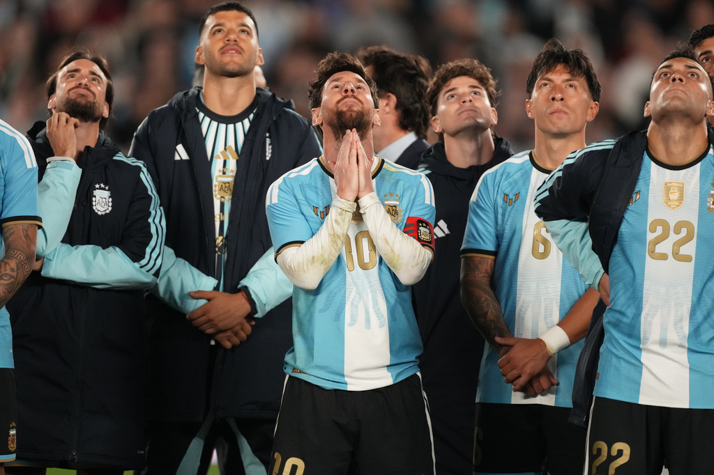 Argentina's Lionel Messi and teammates watch a drone show at the end of his final match for the national team, a soccer friendly against Benin, in Buenos Aires, Argentina, Tuesday, Oct.6, 2026. (AP/Photo/Gustavo Garello)