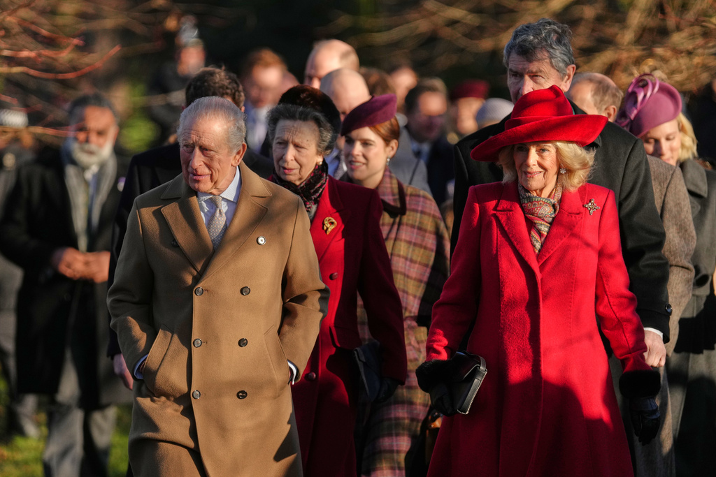 Britain's King Charles III and Queen Camilla arrive to attend the Christmas Day service at St Mary Magdalene Church in Sandringham, Norfolk, England, Thursday, Dec. 25, 2025.(AP Photo/Jon Super)