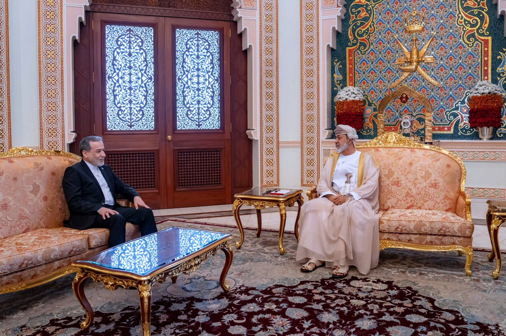In this photo released by the Iranian Foreign Ministry, Iranian Foreign Minister Abbas Araghchi, left, meets with Oman's Sultan Haitham bin Tariq, in Muscat, Oman, Sunday, April 26, 2026. (Iranian Foreign Ministry via AP)