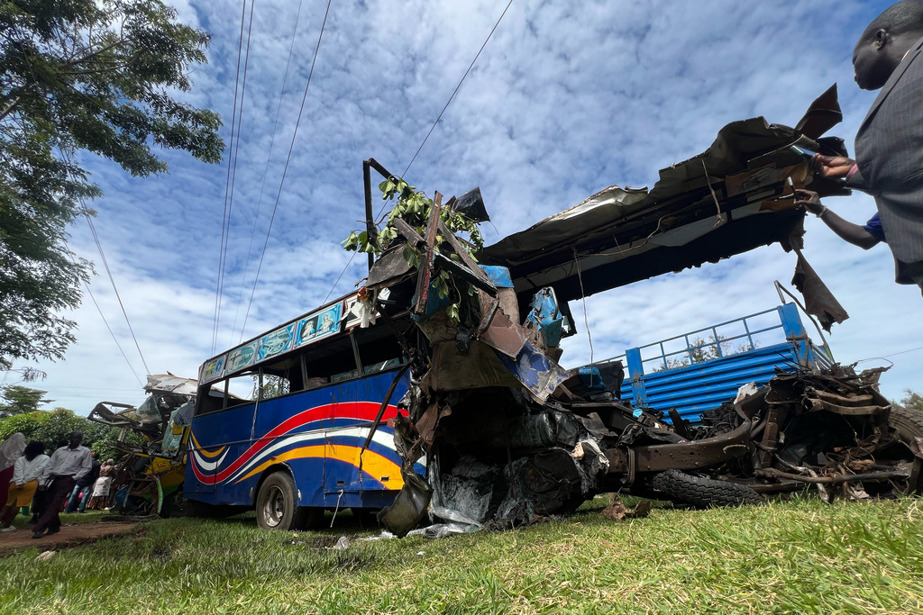 Wreckage of a bus involved in a collision that left several people dead near Kiryandongo on the highway from the Ugandan capital of Kampala to the city of Gulu in northern Uganda, Wednesday, Oct. 22, 2025. (AP Photo/ Hakiim Wampamba)
