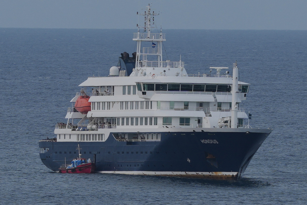 The MV Hondius cruise ship is anchored at a port in Praia, Cape Verde, Wednesday, May 6, 2026. (AP Photo/Misper Apawu)
