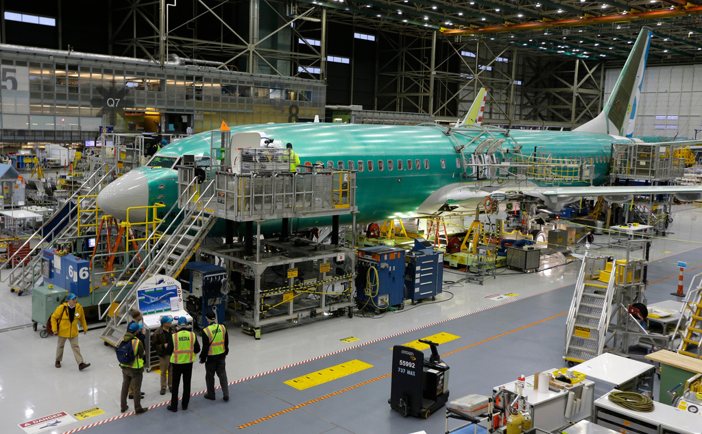 FILE - The second Boeing 737 MAX airplane being built is on the assembly line in Renton, Wash., on Monday, Dec. 7, 2015. (AP Photo/Ted S. Warren, File)