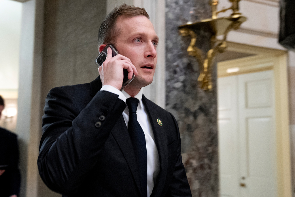 FILE - Rep. Max Miller, R-Ohio, walks out of a meeting with House Majority Leader Steve Scalise of La., on Capitol Hill, Oct. 11, 2023, in Washington. (AP Photo/Andrew Harnik, File)