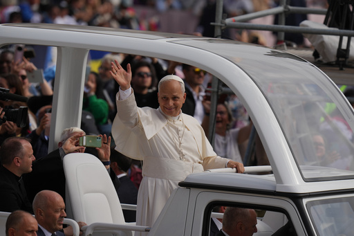Pope Leo XIV waves from his popemobile at the end of a Mass for the Jubilee of Migrants and Missionaries in St. Peter's Square at the Vatican, Sunday, Oct. 5, 2025. (AP Photo/Alessandra Tarantino) Pope Leo XIV waves from his popemobile at the end of a Mass for the Jubilee of Migrants and Missionaries in St. Peter's Square at the Vatican, Sunday, Oct. 5, 2025. (AP Photo/Alessandra Tarantino)