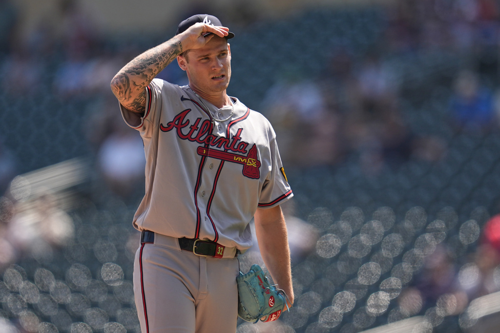 Atlanta Braves starting pitcher AJ Smith-Shawver stands on the mound after loading the bases during the third inning of a baseball game against the Minnesota Twins, Wednesday, Aug. 19, 2026, in Minneapolis. (AP Photo/Abbie Parr)