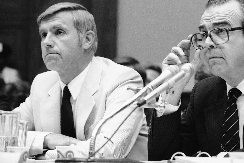 FILE - Dr. William Foege, left, director of the Centers for Disease Control, and Dr. Edward Brandt, assistant secretary of health, face a House Governmental Operations subcommittee on Capitol Hill in Washington on Tuesday, Aug. 3, 1983. (AP Photo/John Duricka, File)