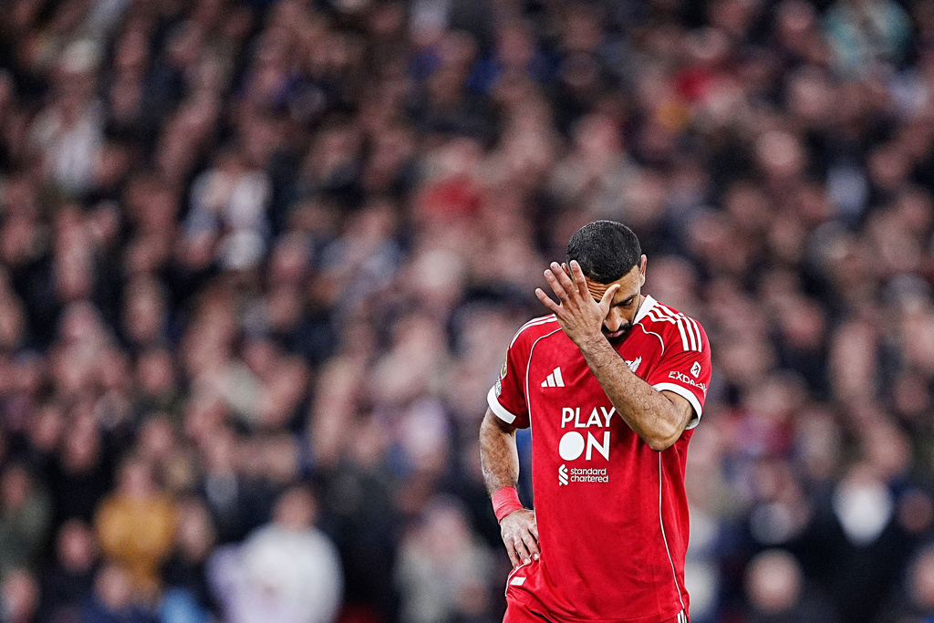 Liverpool's Mohamed Salah reacts during the English Premier League soccer match between Liverpool and Manchester United in Liverpool, England, Sunday, Oct. 19, 2025. (Peter Byrne/PA via AP)