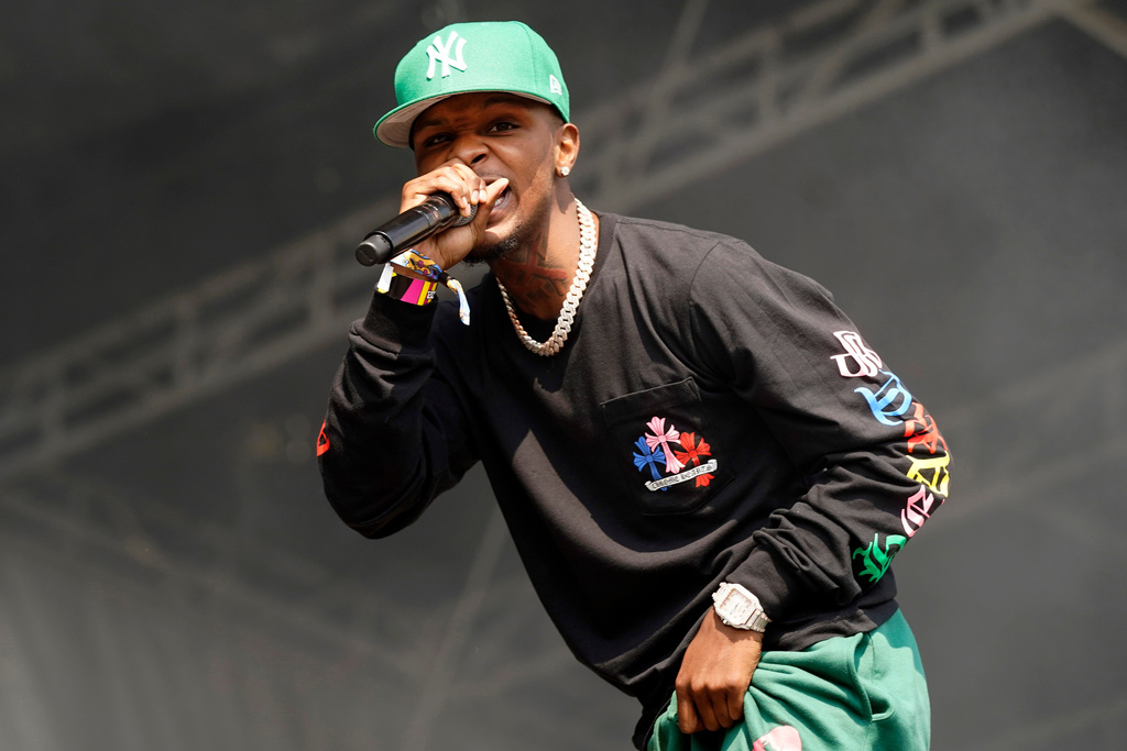 FILE - Toosii performs on day four of the Lollapalooza music festival in Chicago on Aug. 1, 2021. (Photo by Rob Grabowski/Invision/AP, File)