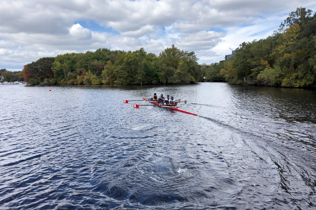 South African rowers, from left, Sheldon Krishnasamy, Lwazi-Tsebo Zwane, Lebone Mokheseng, and Sepitle Leshilo practice on the Charles River in preparation for the Head of the Charles Regatta, Wednesday, Oct. 15, 2025, in Boston. (AP Photo/Rodrique Ngowi)