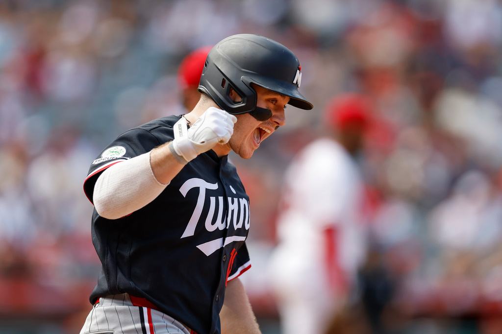 Minnesota Twins' Alan Roden rounds the bases after hitting a three-run home run during the seventh inning of a baseball game against the Los Angeles Angels, Sunday, Sept. 20, 2026, in Anaheim, Calif. (AP Photo/Caroline Brehman)