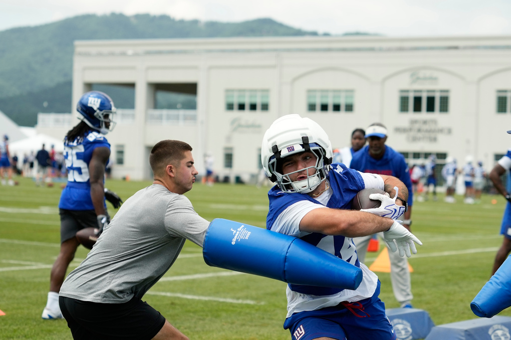 New York Giants running back Cam Skattebo practices during an NFL football training camp, Wednesday, July 29, 2026, in White Sulphur Springs, W.Va. (AP Photo/Chris Carlson)