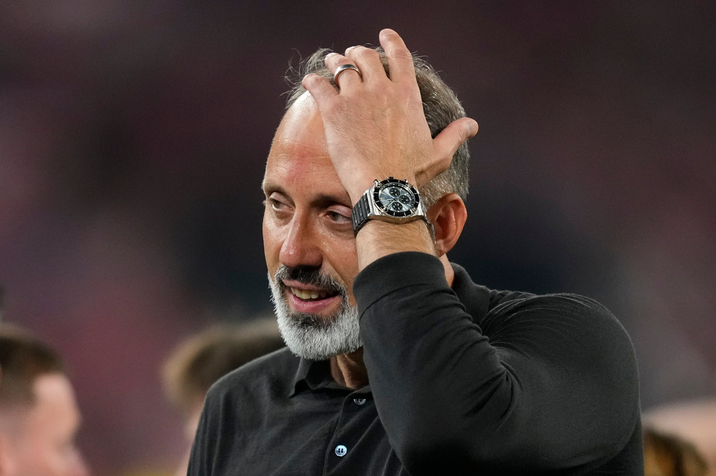 Real Sociedad's head coach Pellegrino Matarazzo celebrates after winning the Copa del Rey final soccer match between Atletico Madrid and Real Sociedad in Seville, Spain, Saturday, April. 18, 2026. (AP Photo/Jose Breton)