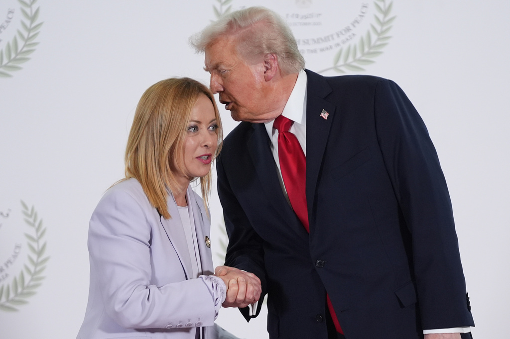 FILE -President Donald Trump greets Italy's Prime Minister Giorgia Meloni during summit to support ending the more than two-year Israel-Hamas war in Gaza after a breakthrough ceasefire deal, Oct. 13, 2025, in Sharm El Sheikh, Egypt. (AP Photo/Evan Vucci, Pool, File)