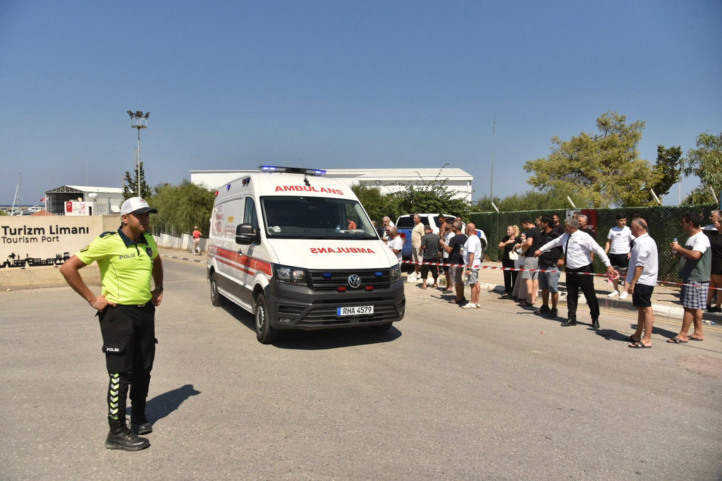 An ambulance arrives at the port of Kyrenia in the Turkish occupied northern part of Cyprus, Sunday, Aug. 30, 2026, after a catamaran-style ferry overturned off the northern coast of Cyprus. (AP Photo)