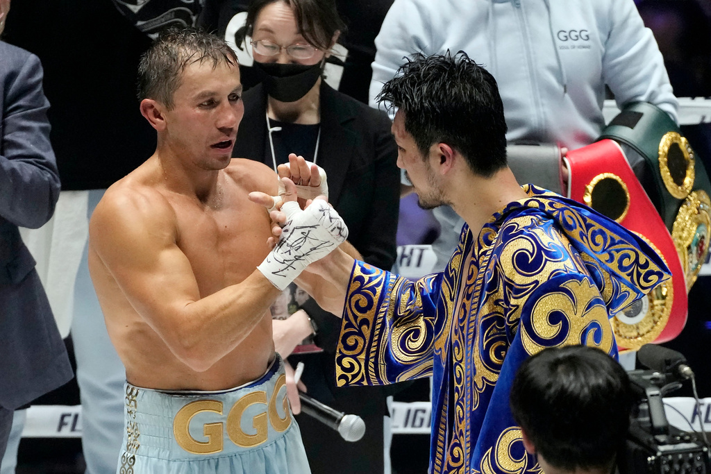 FILE - Gennadiy Golovkin, of Kazakhstan, left, and Ryota Murata, of Japan, greet each other after a boxing title match in Saitama, near Tokyo, April 9, 2022. (AP Photo/Shuji Kajiyama, File)