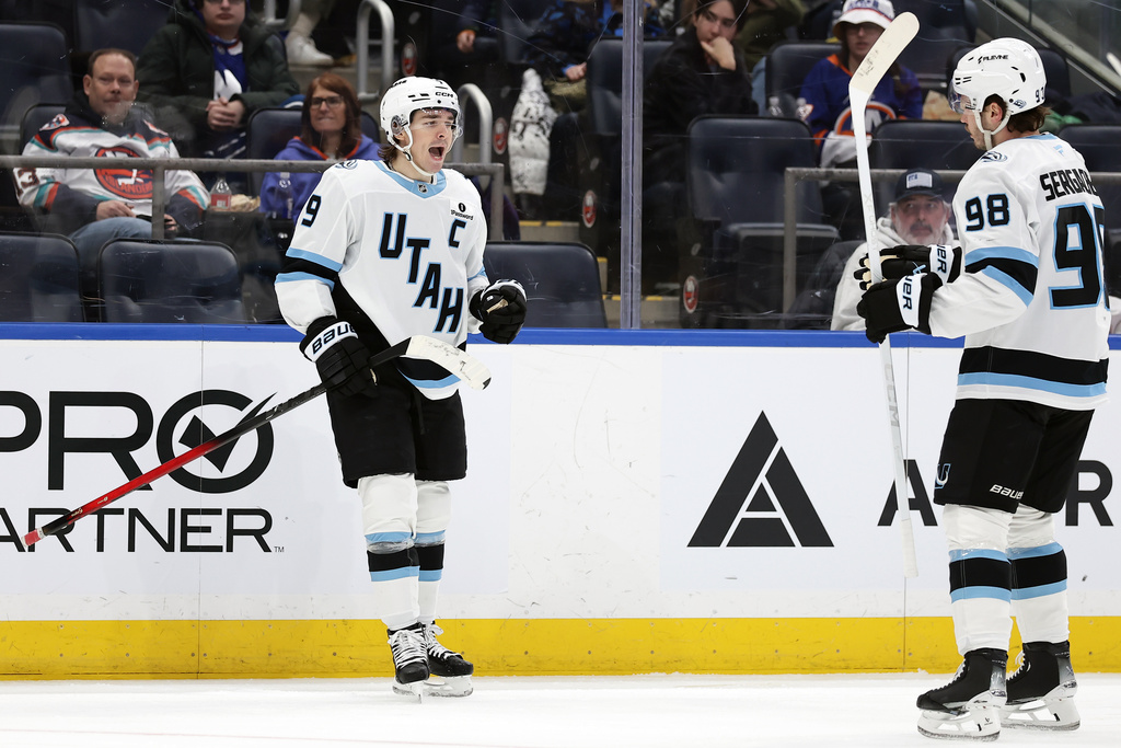 Utah Mammoth right wing Clayton Keller (9) reacts after scoring a goal in the third period of an NHL hockey game against the New York Islanders, Thursday, Jan. 1, 2026, in Elmont, N.Y. (AP Photo/Adam Hunger)