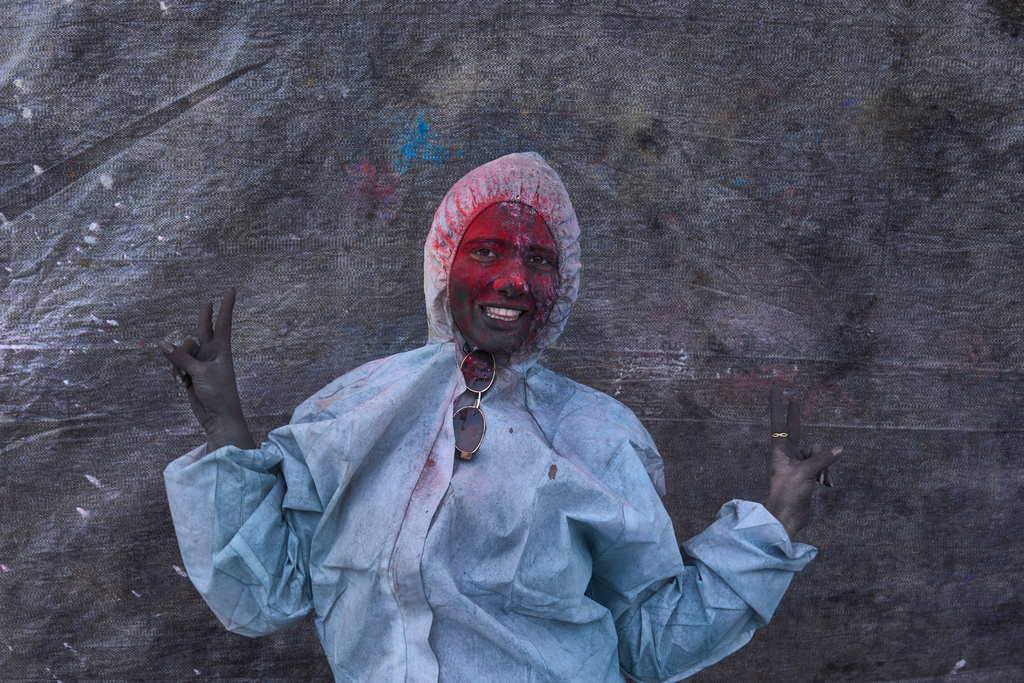 Panagiota Sakandari, age 29, poses for a photograph as she participates in the annual flour war marking the end of the Carnival season on Clean Monday in Galaxidi, about 200 kilometers (120 miles) west of Athens, Monday Feb. 23, 2026, at the start of the 40-day Christian Lent fast leading to Easter. (AP Photo/Petros Giannakouris)